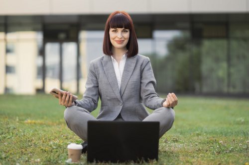 calm young woman relaxing meditating sitting outd 2022 04 27 03 32 21 utc